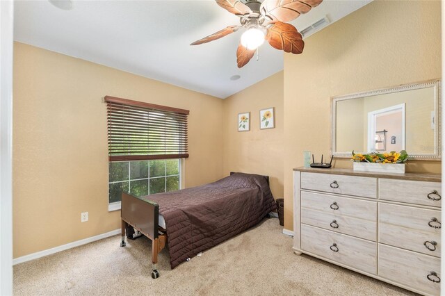 12495 SW 66th St, Ocala, FL 34481 - carpeted bedroom with vaulted ceiling, baseboards, and a ceiling fan