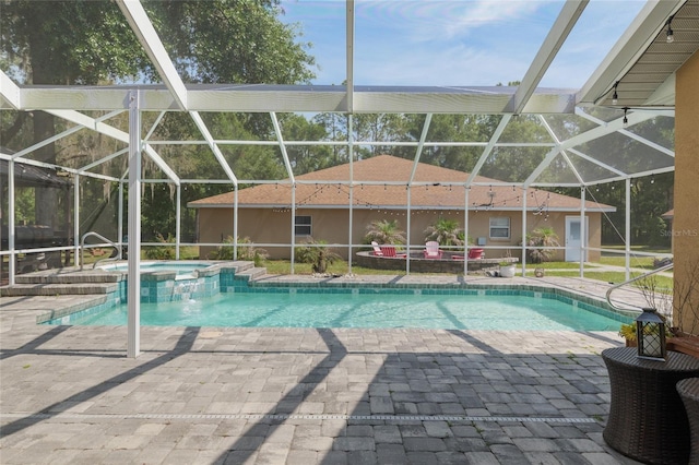 12495 SW 66th St, Ocala, FL 34481 - view of pool featuring a patio area, a pool with connected hot tub, and a lanai