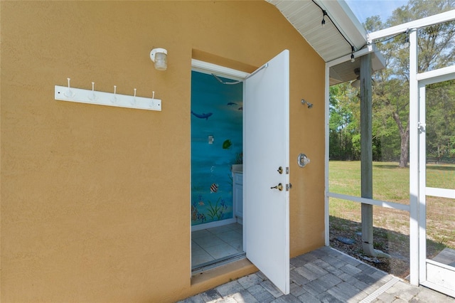 12495 SW 66th St, Ocala, FL 34481 - entrance to property featuring stucco siding and a yard