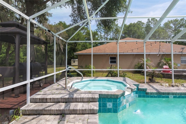 12495 SW 66th St, Ocala, FL 34481 - view of swimming pool with a lanai and a pool with connected hot tub