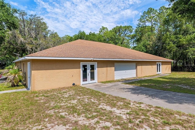 12495 SW 66th St, Ocala, FL 34481 - view of front of home with french doors and stucco siding