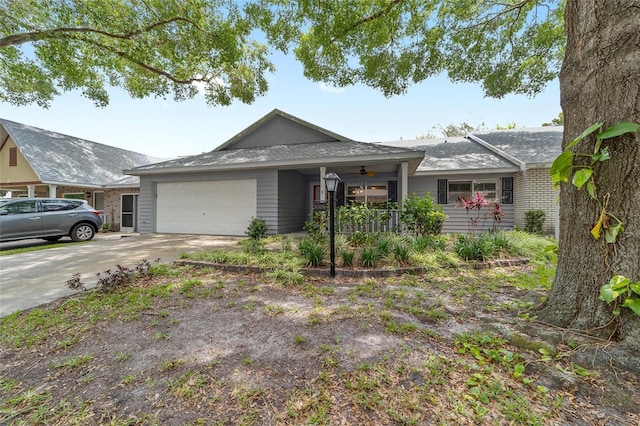 8745 SW 92nd St Unit B, Ocala, FL 34481 - ranch-style home with an attached garage, covered porch, driveway, and a shingled roof