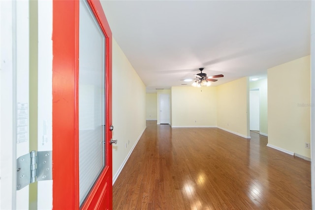 8745 SW 92nd St Unit B, Ocala, FL 34481 - spare room featuring a ceiling fan, wood finished floors, and baseboards