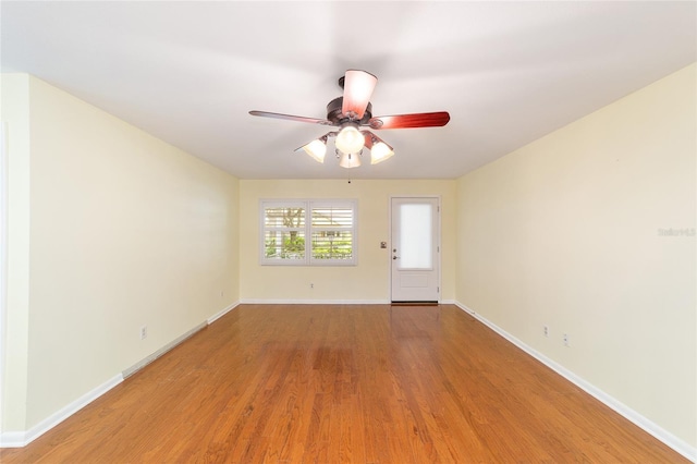 8745 SW 92nd St Unit B, Ocala, FL 34481 - spare room with ceiling fan, light wood-type flooring, and baseboards