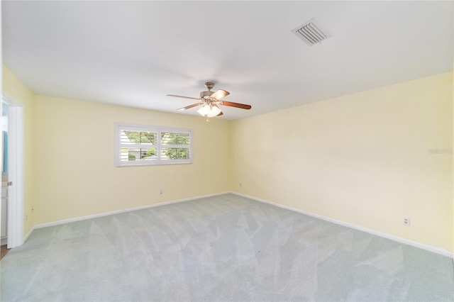 8745 SW 92nd St Unit B, Ocala, FL 34481 - unfurnished room featuring ceiling fan, light colored carpet, and baseboards