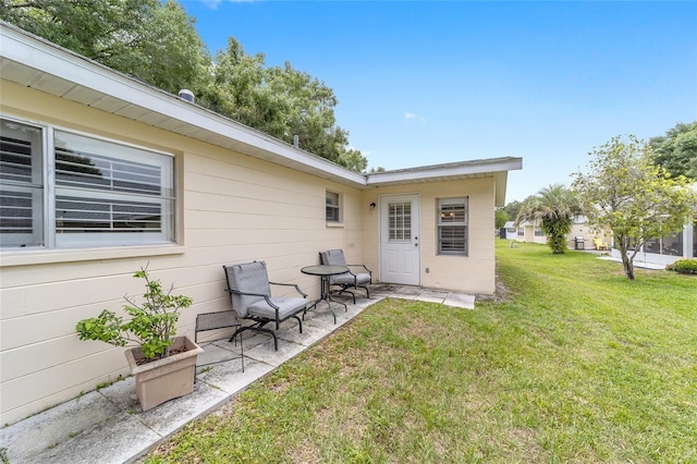 8745 SW 92nd St Unit B, Ocala, FL 34481 - view of grassy yard with a patio area