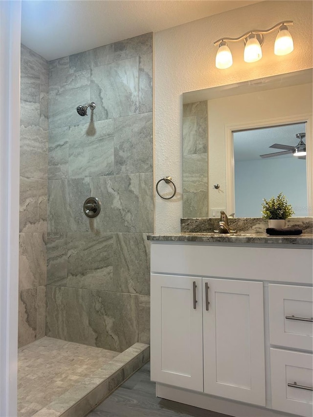 960 NW Redwood Dr, Dunnellon, FL 34431 - bathroom with a walk in shower, vanity, and wood finished floors