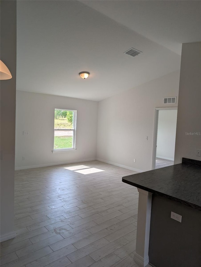 2825 SW 147th Ct, Ocala, FL 34481 - spare room with baseboards and wood finished floors