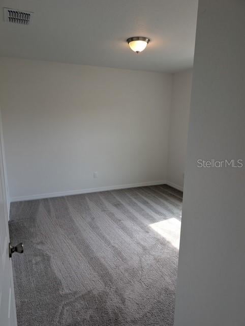 2825 SW 147th Ct, Ocala, FL 34481 - unfurnished room featuring carpet floors and baseboards