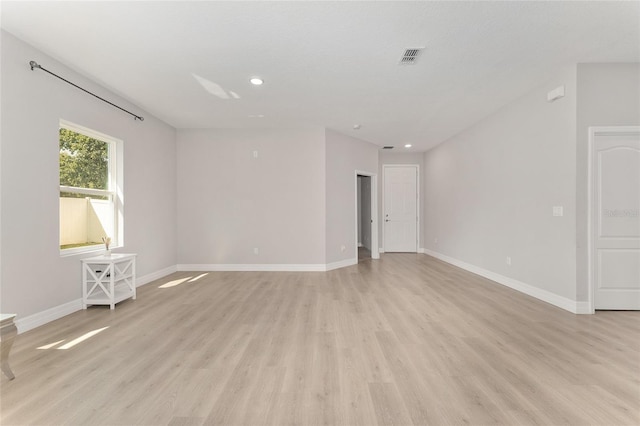 14055 SW 30th Terrace Rd, Ocala, FL 34473 - empty room with light wood-style floors, baseboards, and recessed lighting