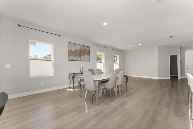 14055 SW 30th Terrace Rd, Ocala, FL 34473 - dining room featuring light wood-style floors, baseboards, and recessed lighting