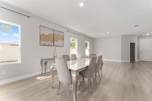 14055 SW 30th Terrace Rd, Ocala, FL 34473 - dining area featuring light wood finished floors, baseboards, and recessed lighting