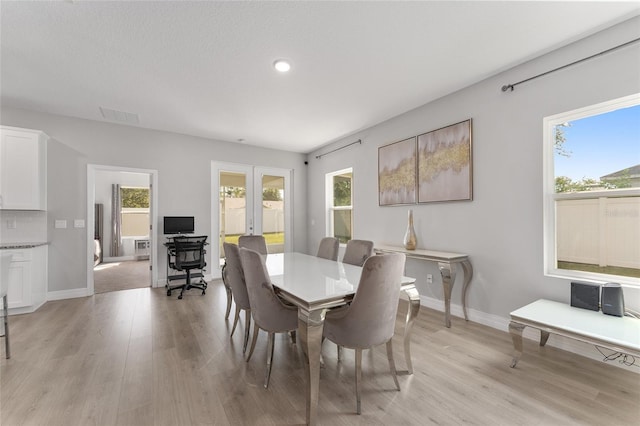 14055 SW 30th Terrace Rd, Ocala, FL 34473 - dining room featuring light wood-style floors, baseboards, and recessed lighting