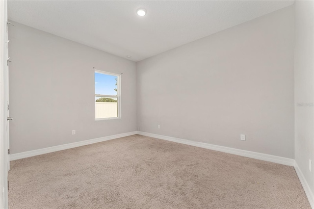 14055 SW 30th Terrace Rd, Ocala, FL 34473 - carpeted empty room featuring baseboards and recessed lighting