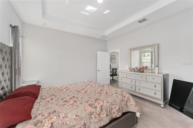 14055 SW 30th Terrace Rd, Ocala, FL 34473 - bedroom with light colored carpet and a tray ceiling