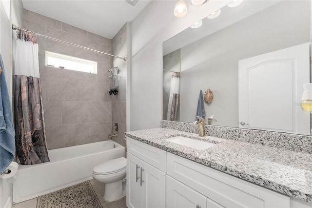 14055 SW 30th Terrace Rd, Ocala, FL 34473 - full bathroom featuring shower / bathtub combination with curtain, vanity, toilet, and tile patterned flooring