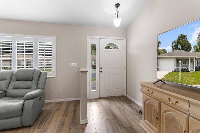 14481 SW 112th Cir, Dunnellon, FL 34432 - entryway featuring light wood-style flooring and baseboards