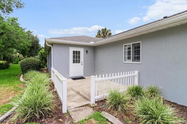 14481 SW 112th Cir, Dunnellon, FL 34432 - view of exterior entry with stucco siding