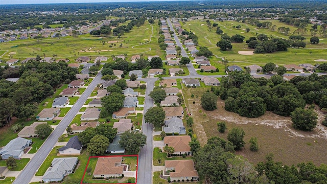 9891 SE 138th Loop, Summerfield, FL 34491 - aerial view of property's location with property boundaries highlighted, nearby suburban area, and a local golf course