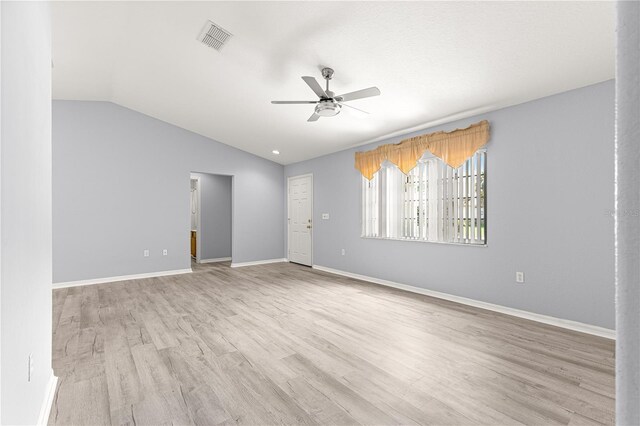 9891 SE 138th Loop, Summerfield, FL 34491 - spare room featuring ceiling fan, wood finished floors, lofted ceiling, and baseboards