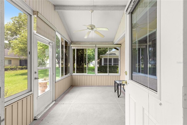 9891 SE 138th Loop, Summerfield, FL 34491 - unfurnished sunroom featuring ceiling fan, vaulted ceiling, and healthy amount of natural light
