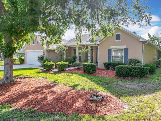 16 Ryewood Cir, Homosassa, FL 34446 - view of front facade featuring stucco siding, driveway, a garage, and a front lawn