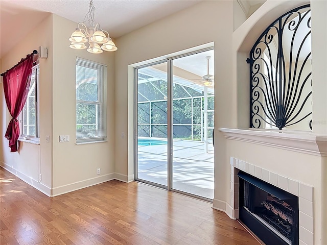 16 Ryewood Cir, Homosassa, FL 34446 - doorway featuring healthy amount of natural light, wood finished floors, and baseboards