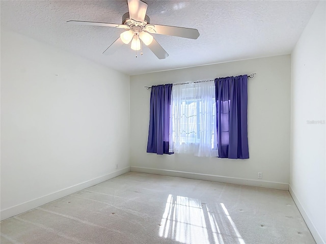 16 Ryewood Cir, Homosassa, FL 34446 - unfurnished room with a textured ceiling, carpet, baseboards, and ceiling fan