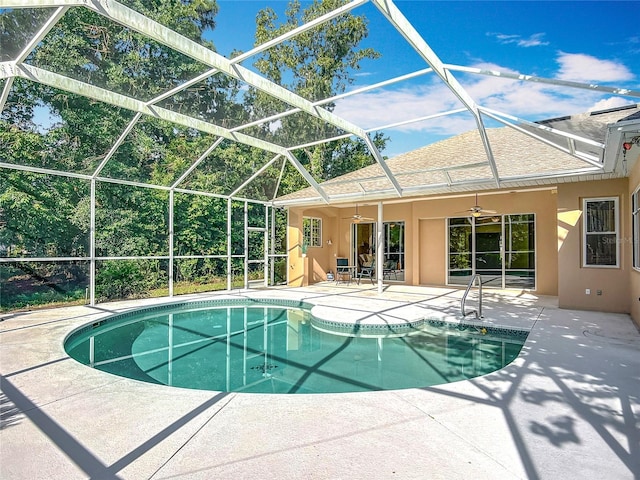16 Ryewood Cir, Homosassa, FL 34446 - outdoor pool with a ceiling fan, a patio area, and glass enclosure