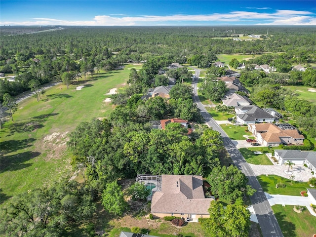 16 Ryewood Cir, Homosassa, FL 34446 - aerial view of property and surrounding area featuring a forest, a golf club, and nearby suburban area