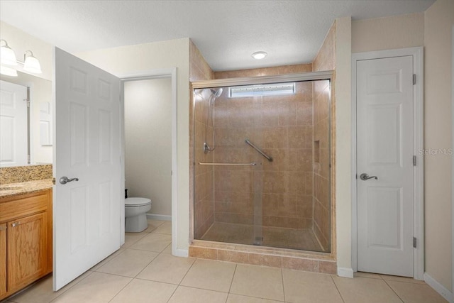 4225 SW 57th Ave, Ocala, FL 34474 - full bath with a shower stall, vanity, tile patterned floors, toilet, and a textured ceiling