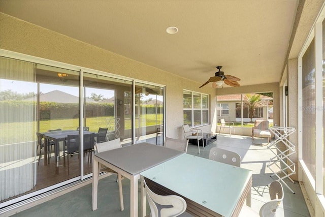 4225 SW 57th Ave, Ocala, FL 34474 - sunroom with outdoor dining area and ceiling fan