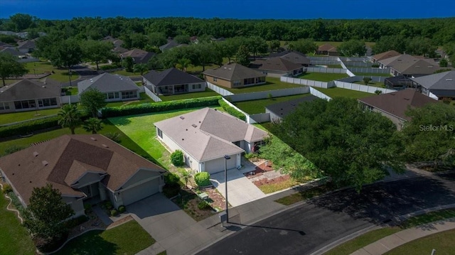 4225 SW 57th Ave, Ocala, FL 34474 - aerial perspective of suburban area with a heavily wooded area