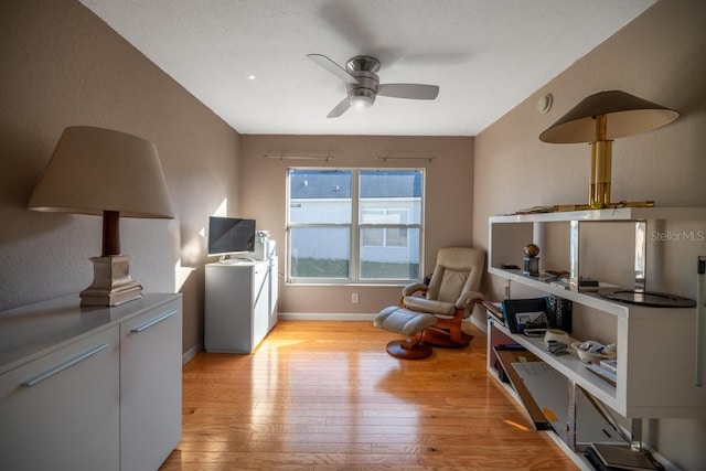 4225 SW 57th Ave, Ocala, FL 34474 - living area featuring light wood-style flooring, ceiling fan, and baseboards