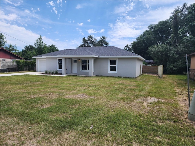 541 56th Ct, Ocala, FL 34482 - ranch-style house with concrete driveway, an attached garage, stucco siding, and roof with shingles