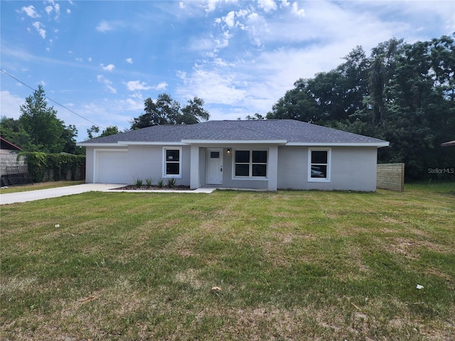 541 56th Ct, Ocala, FL 34482 - ranch-style home featuring an attached garage, concrete driveway, stucco siding, and a front yard