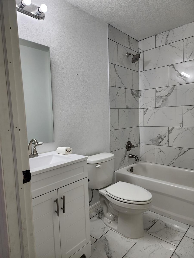 541 56th Ct, Ocala, FL 34482 - full bathroom featuring marble look tile flooring, a textured ceiling, vanity, bathing tub / shower combination, and toilet