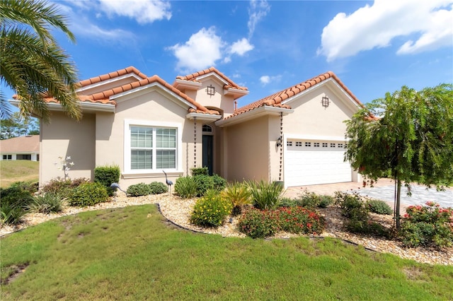 7210 SW 179th Ct, Dunnellon, FL 34432 - mediterranean / spanish home featuring a garage, stucco siding, a tile roof, a front yard, and driveway