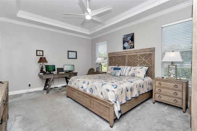 7210 SW 179th Ct, Dunnellon, FL 34432 - bedroom featuring light colored carpet, a raised ceiling, ornamental molding, a desk, and ceiling fan