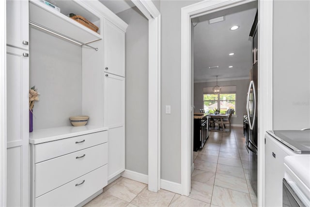 7210 SW 179th Ct, Dunnellon, FL 34432 - mudroom with baseboards, light marble finish flooring, recessed lighting, and ornamental molding