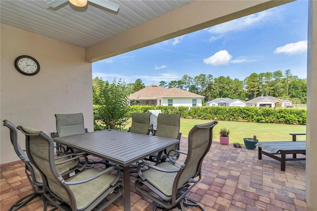 7210 SW 179th Ct, Dunnellon, FL 34432 - view of patio / terrace with outdoor dining area and ceiling fan
