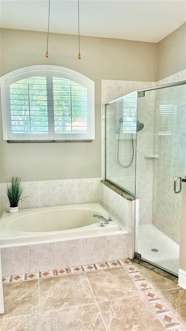 1138 Lumsden Trace Cir, Valrico, FL 33594 - bathroom featuring a garden tub and a shower stall