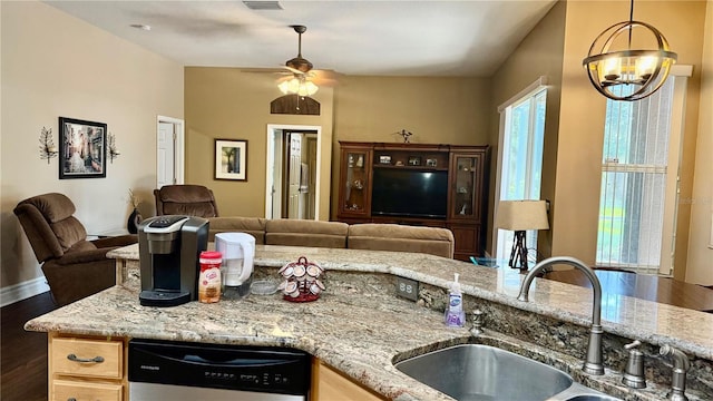 1138 Lumsden Trace Cir, Valrico, FL 33594 - kitchen featuring a sink, open floor plan, dishwasher, wood finished floors, and a chandelier