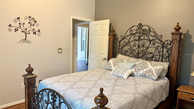 1138 Lumsden Trace Cir, Valrico, FL 33594 - bedroom with wood finished floors and baseboards