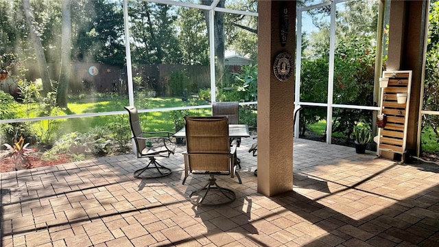 1138 Lumsden Trace Cir, Valrico, FL 33594 - sunroom / solarium with outdoor dining area