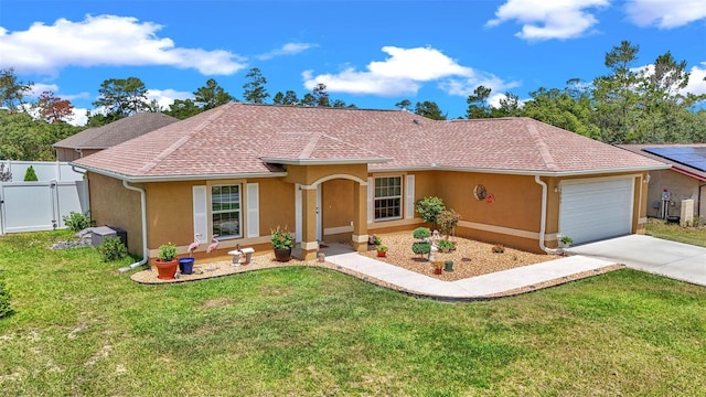 16969 SW 40th Cir, Ocala, FL 34473 - ranch-style house with stucco siding, an attached garage, concrete driveway, and a shingled roof