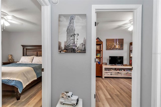 16969 SW 40th Cir, Ocala, FL 34473 - bedroom featuring wood finished floors and a ceiling fan