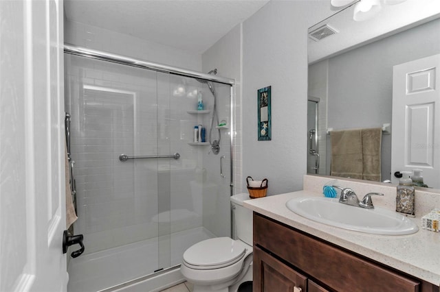 16969 SW 40th Cir, Ocala, FL 34473 - full bathroom with toilet, a stall shower, and vanity