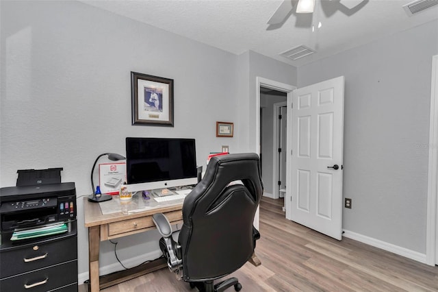 16969 SW 40th Cir, Ocala, FL 34473 - office area featuring ceiling fan, light wood-style floors, and baseboards