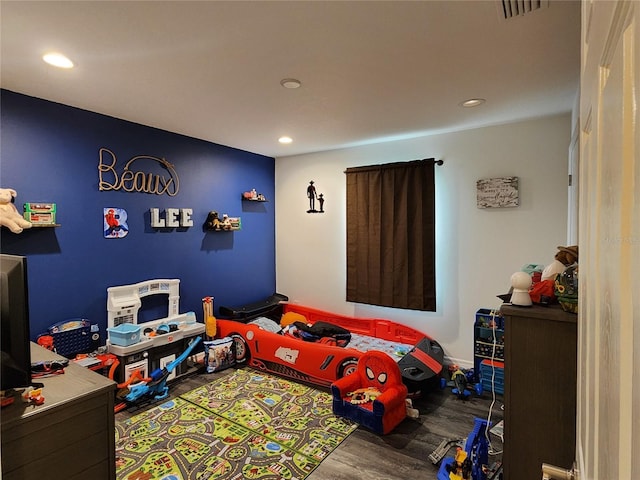 120 Fisher Ct, Ocklawaha, FL 32179 - bedroom featuring wood finished floors and recessed lighting